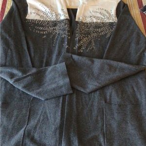 Gray and white with silver Embellishment’s on the front